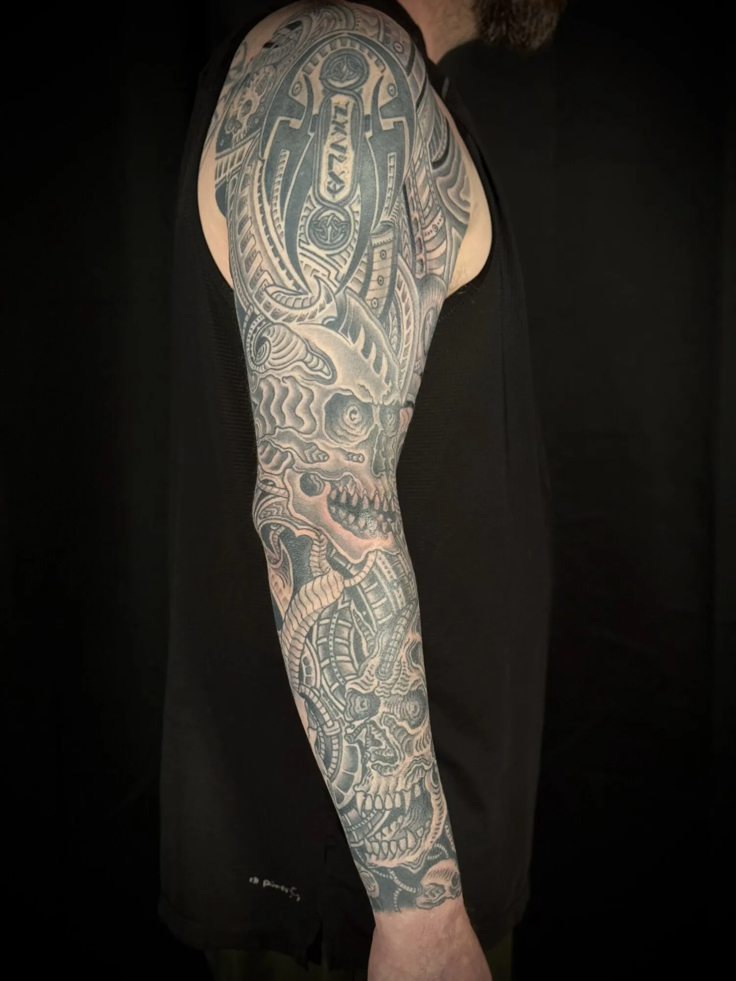 Biomechanical black and grey full sleeve tattoo by Josh Robinson in Dallas, TX