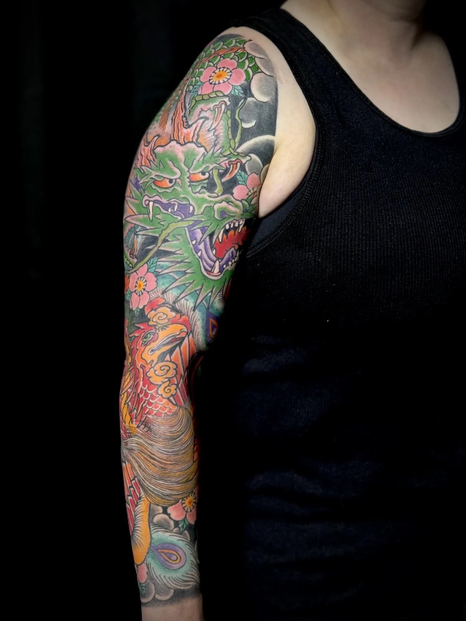 Japanese dragon and cherry blossom full sleeve tattoo in color by Josh Robinson in Dallas, TX