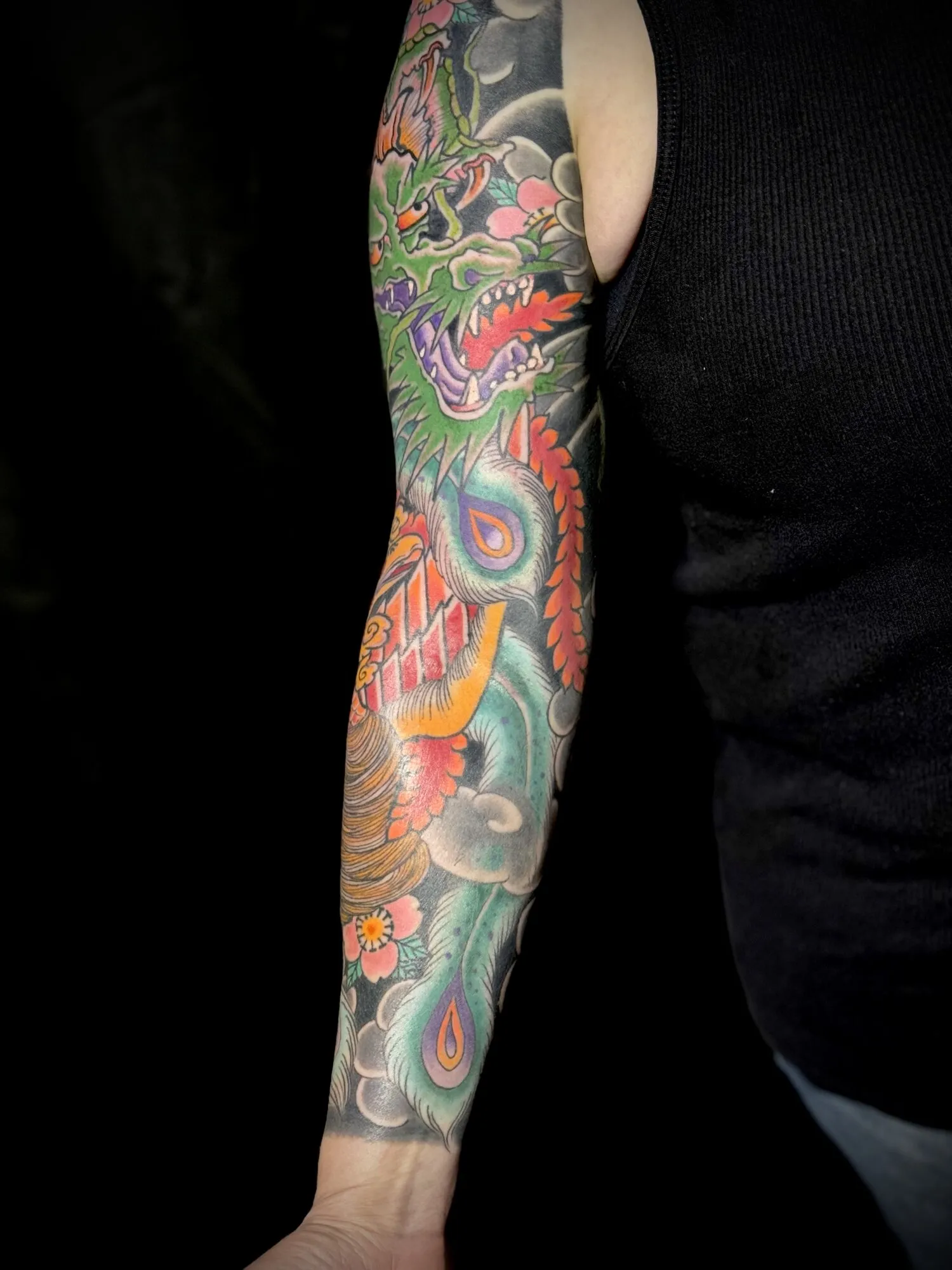 Japanese dragon and koi fish full sleeve tattoo in color by Josh Robinson in Dallas, TX