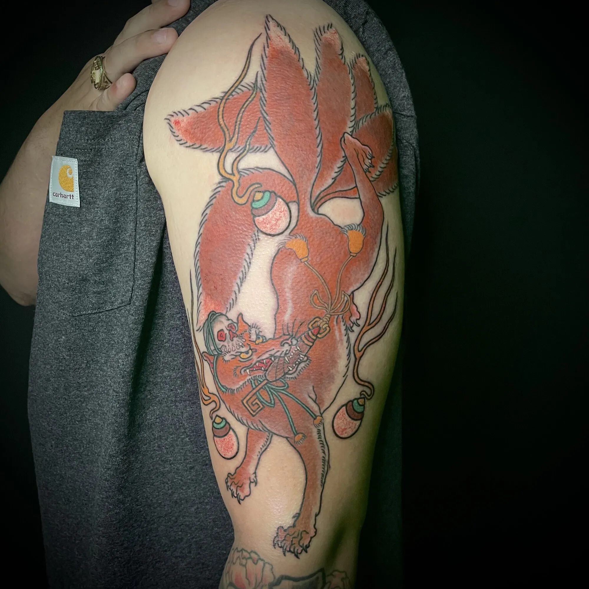 Japanese nine-tailed fox kitsune half sleeve tattoo in red by Josh Robinson in Dallas, TX